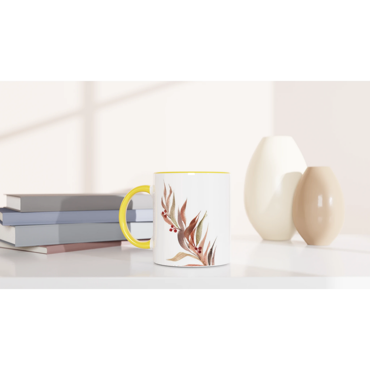 Watercolor berry branch coffee mug on a shelf with books and vases